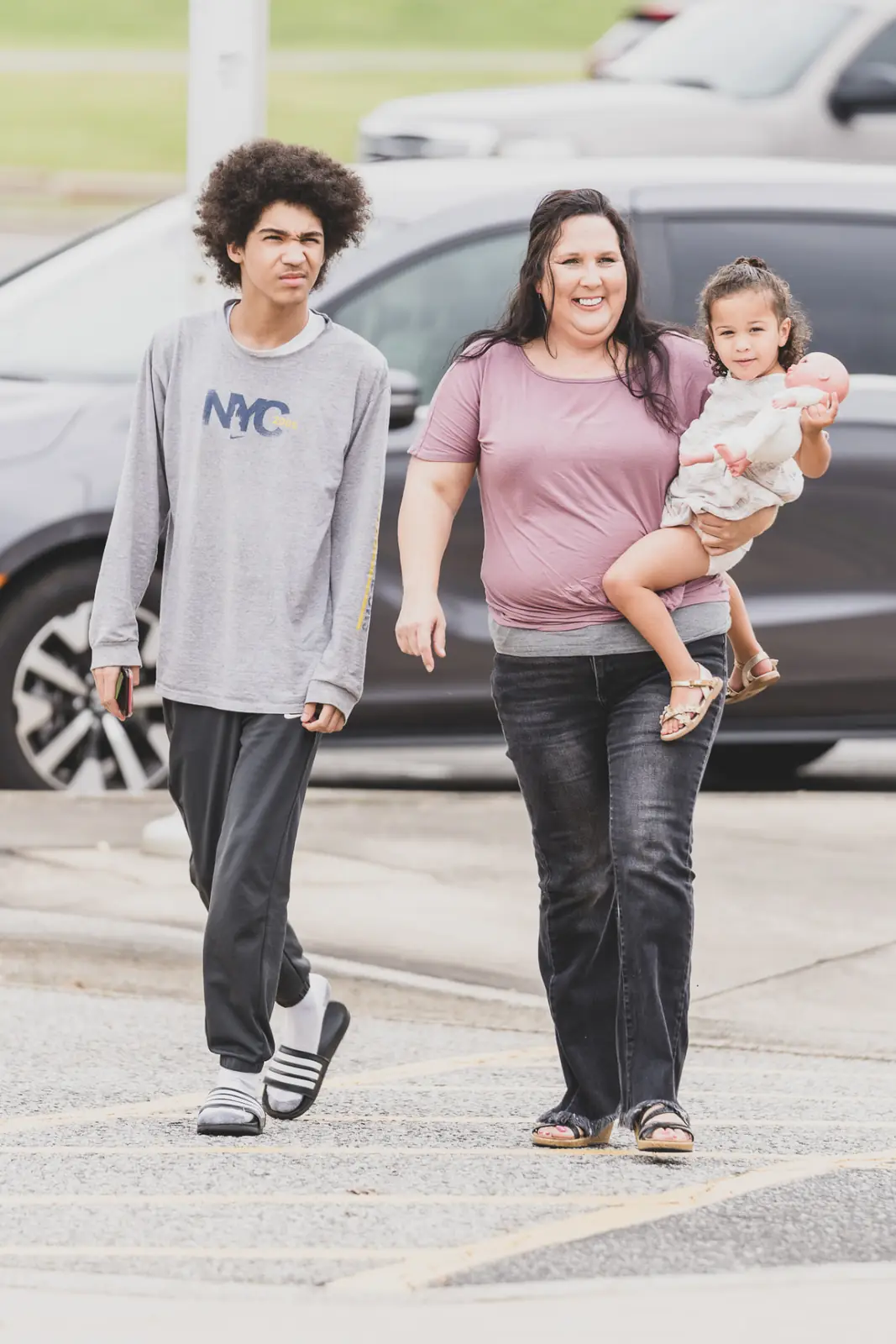 A family walking in together on a Sunday morning at Kingdom House