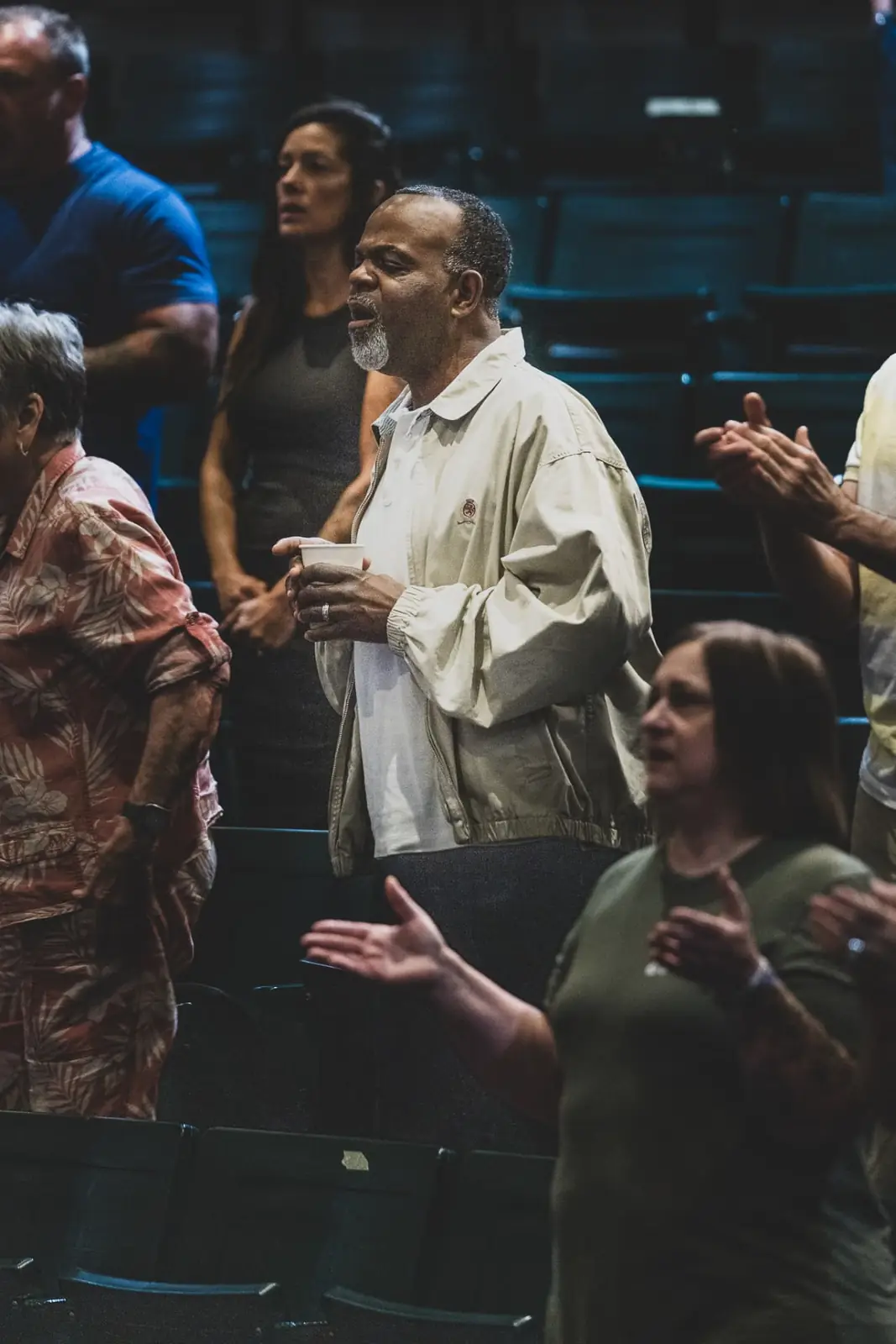 Congregation singing together during worship