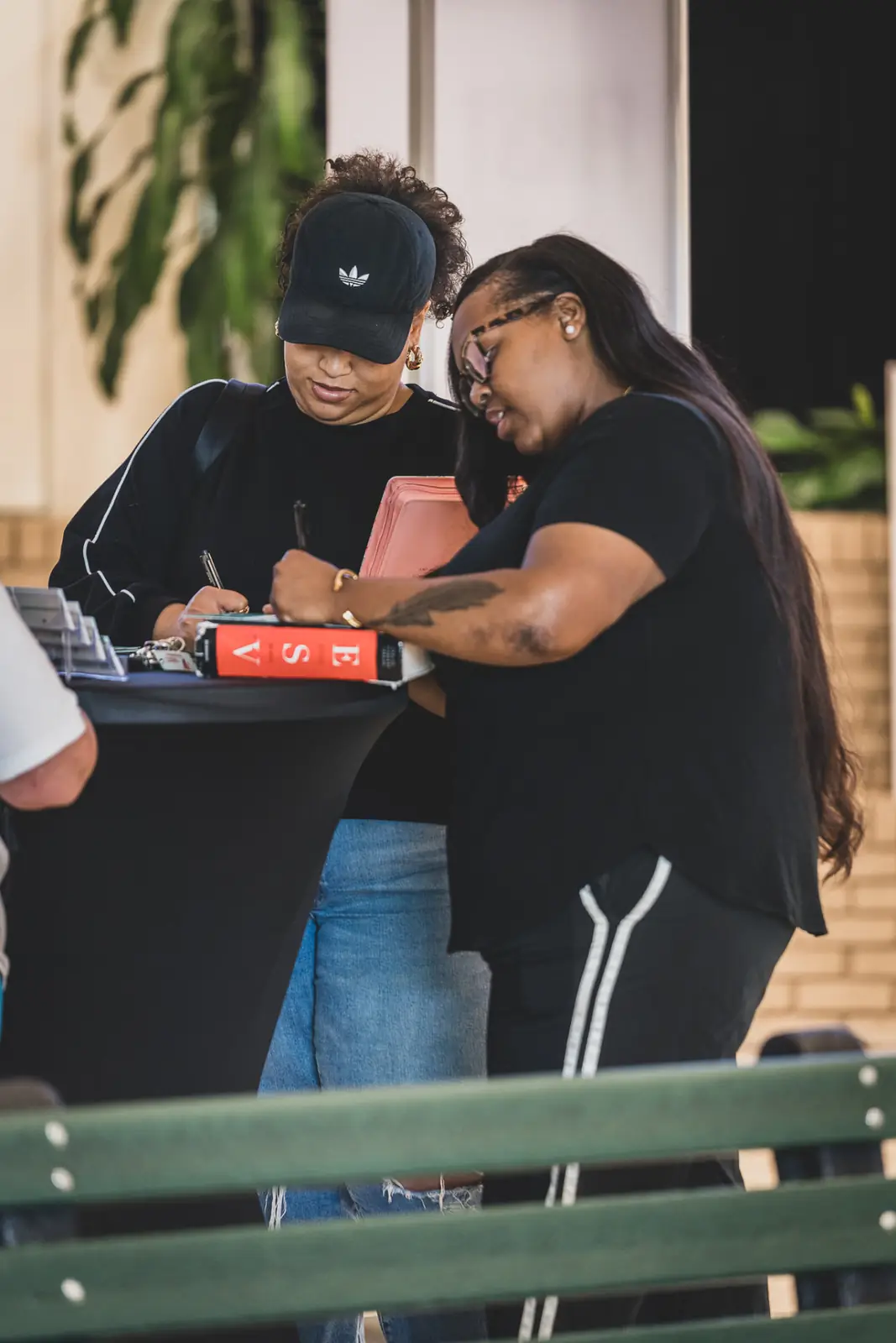 Guests filling out a connect card at Kingdom House in Concord, NC