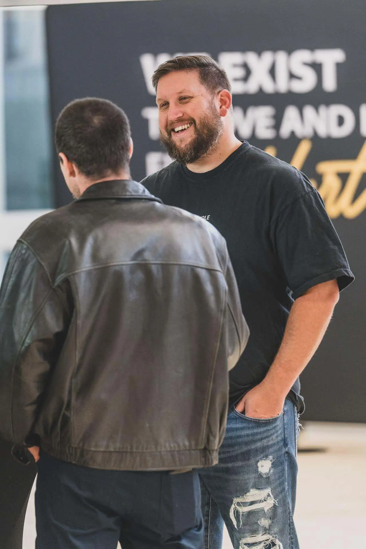 A Kingdom House volunteer welcoming a first-time guest