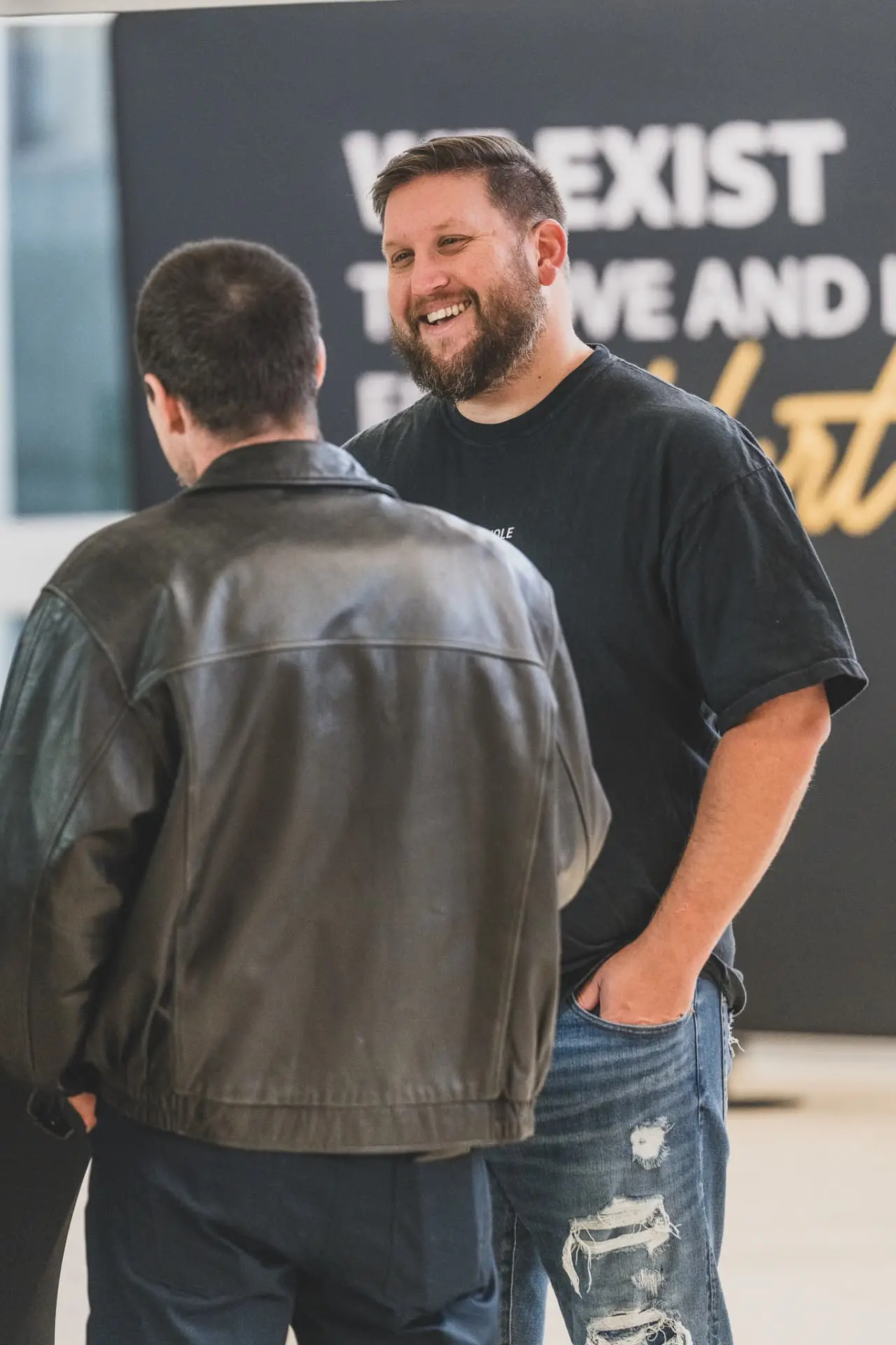 A Kingdom House volunteer welcoming a first-time guest